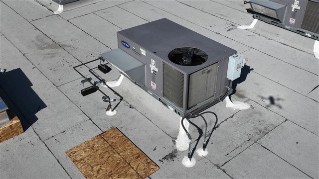 Rooftop HVAC package unit on a commercial building