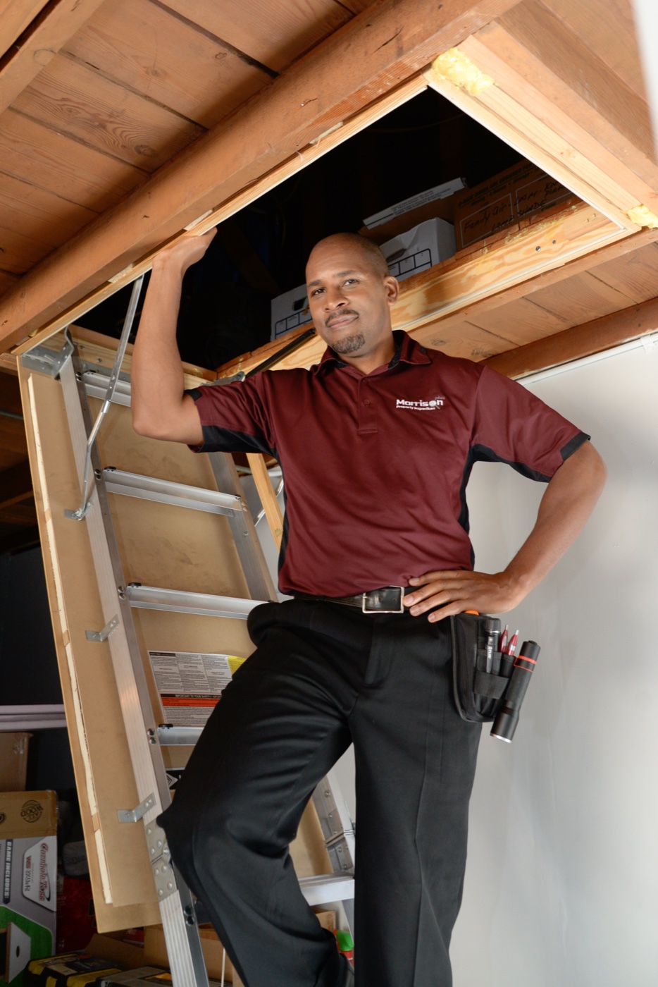 Morrison Plus inspector checking a home's attic access