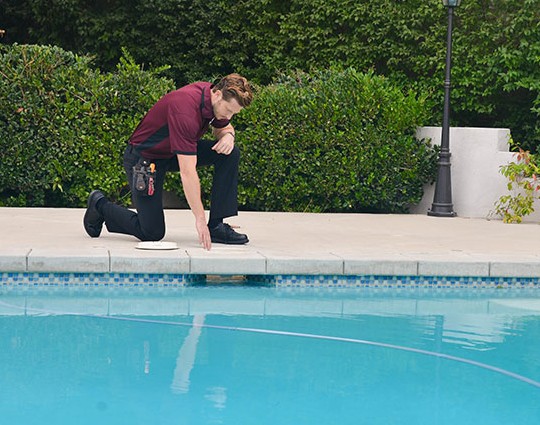 Morrison Plus inspector inspecting a pool and spa